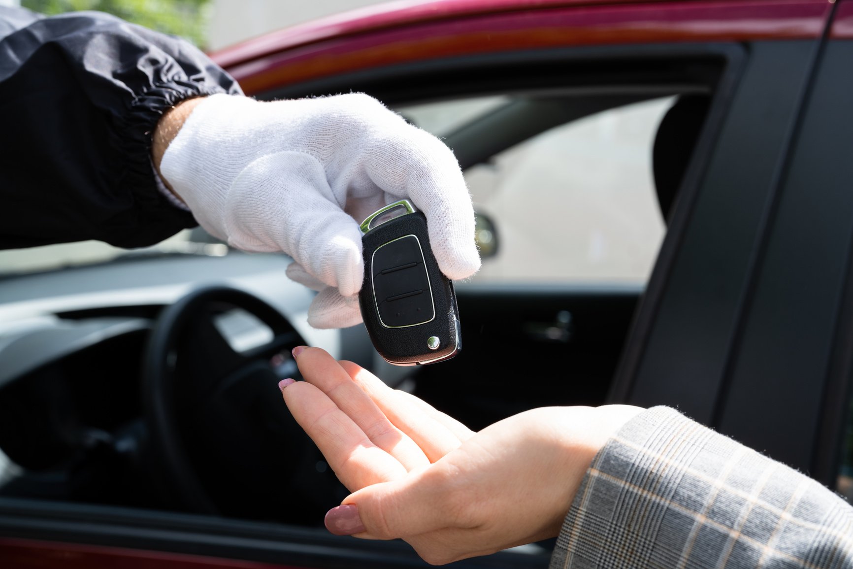 Valet Parking Giving Car Key To Woman